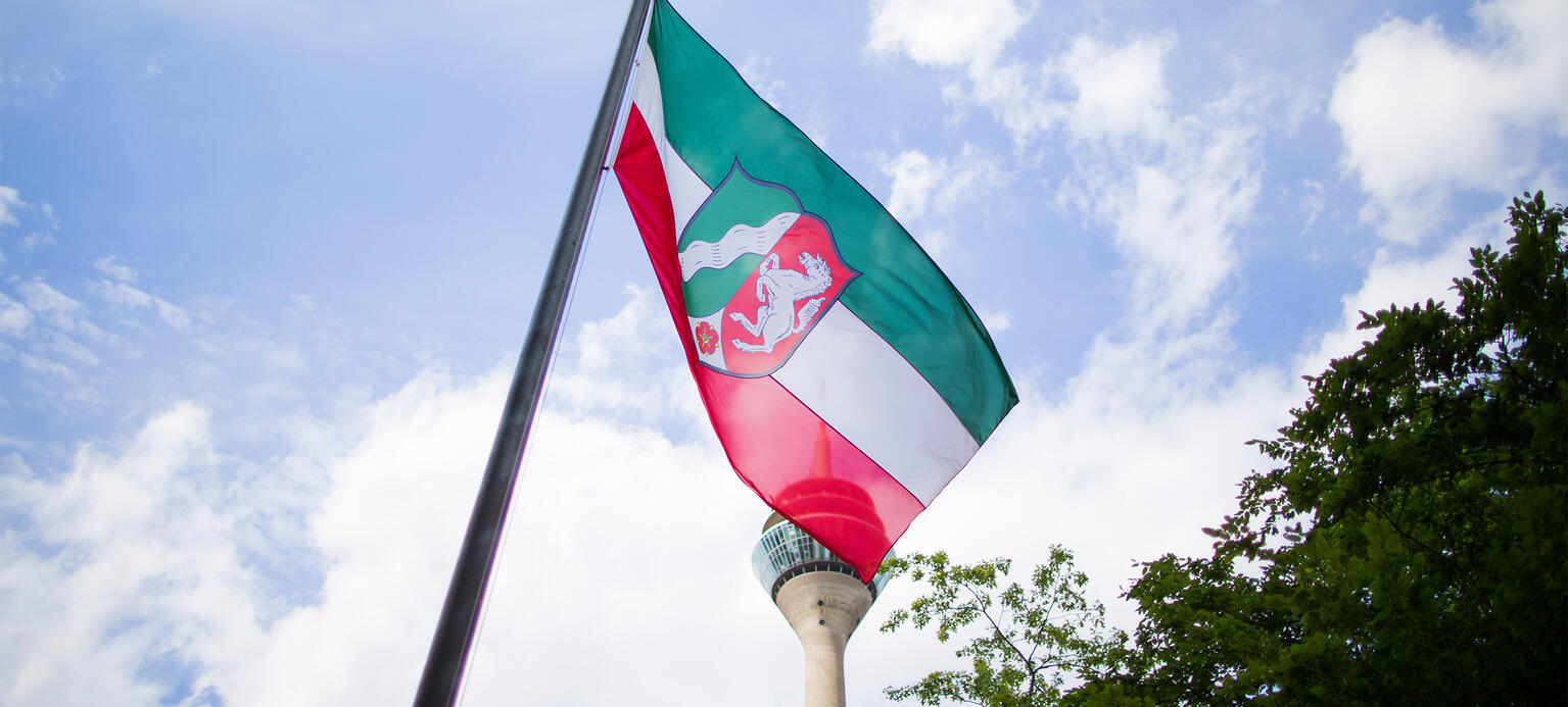 Flagge NRW, Tarifbindung, Tariflöhne, Tarifsystem