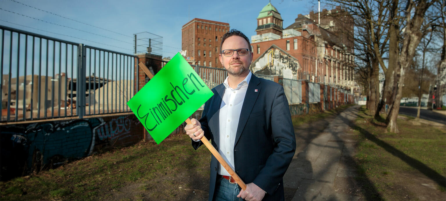 Guido Zeitler Vorsitzender der Gewerkschaft Nahrung- Genuss-Gaststätten (NGG), mit Schriftzug 'Einmischen'